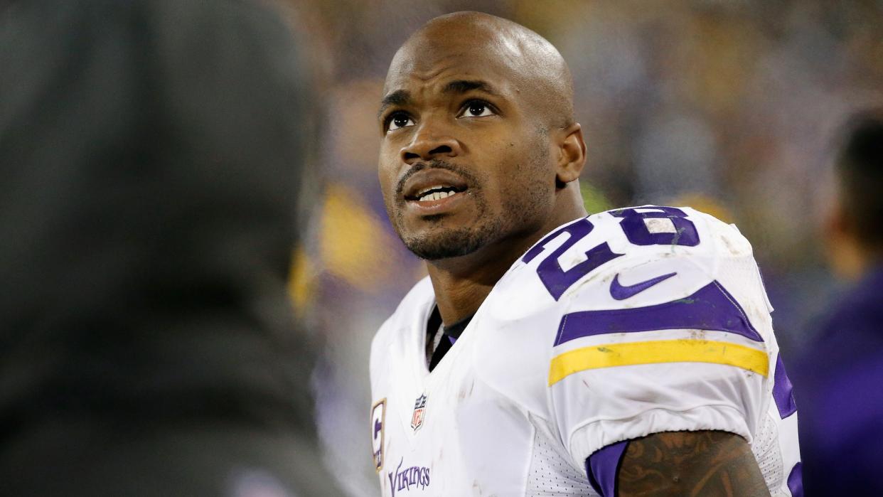 GREEN BAY, WI - JANUARY 03:  Adrian Peterson #28 of the Minnesota Vikings looks on during the second half against the Green Bay Packers at Lambeau Field on January 3, 2016 in Green Bay, Wisconsin.