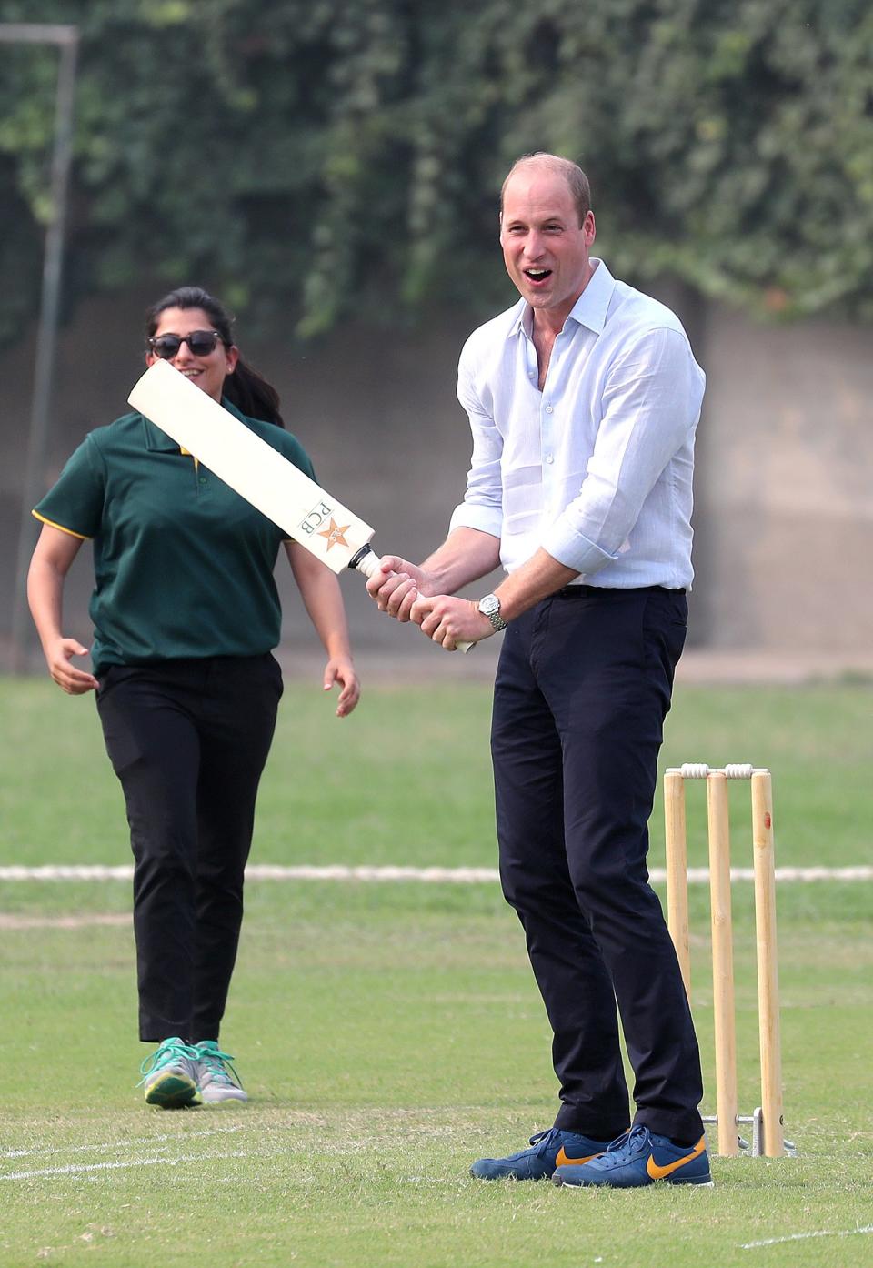 The sporty couple then took part in the match with a group of children at the National Cricket Academy in Lahore on Thursday. The two teams had a mix of boys and girls from underprivileged backgrounds between the ages of 10 and 14 years old. William took to the crease for the first few balls — and after missing one, made a fantastic hit out of the field for six runs. And he was applauded by Kate who stood at the opposite end of the field.