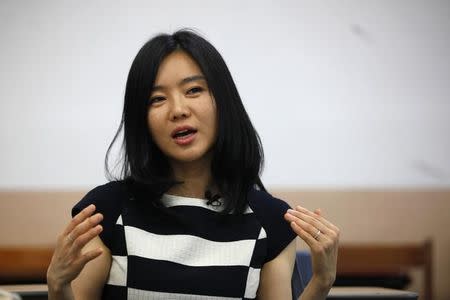 Lee Hyeon-seo, 33, who came to South Korea in 2008, speaks during an interview with Reuters in Seoul, May 29, 2013. REUTERS/Kim Hong-Ji/Files