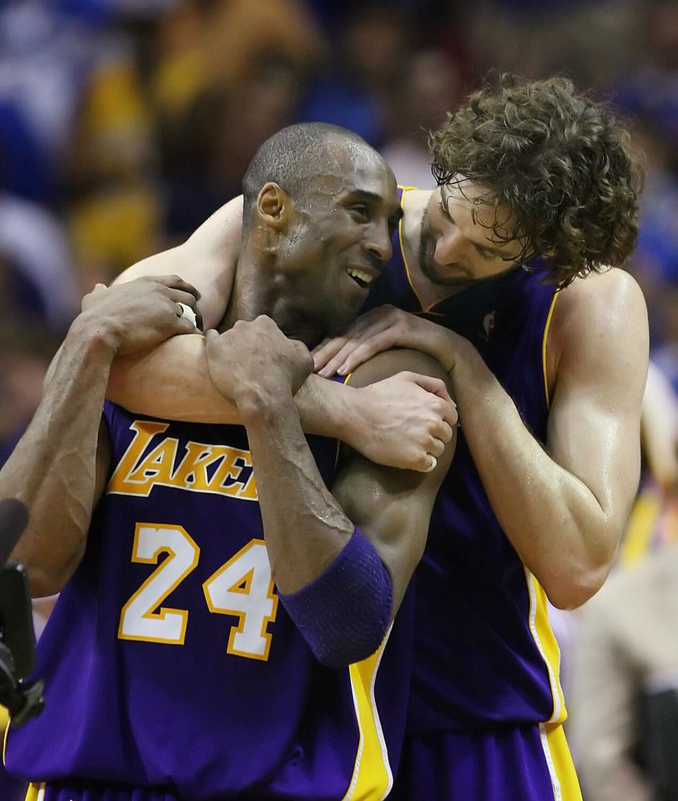 Pau Gasol and Kobe Bryant share a warm embrace toward the end of Game 5 of the 2009 NBA Finals.