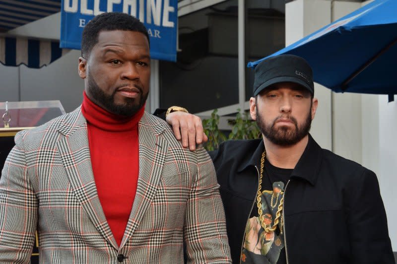 Curtis "50 Cent" Jackson (L) is joined by rapper Eminem during an unveiling ceremony honoring Jackson with the 2,686th star on the Hollywood Walk of Fame in 2020 in Los Angeles. File Photo by Jim Ruymen/UPI