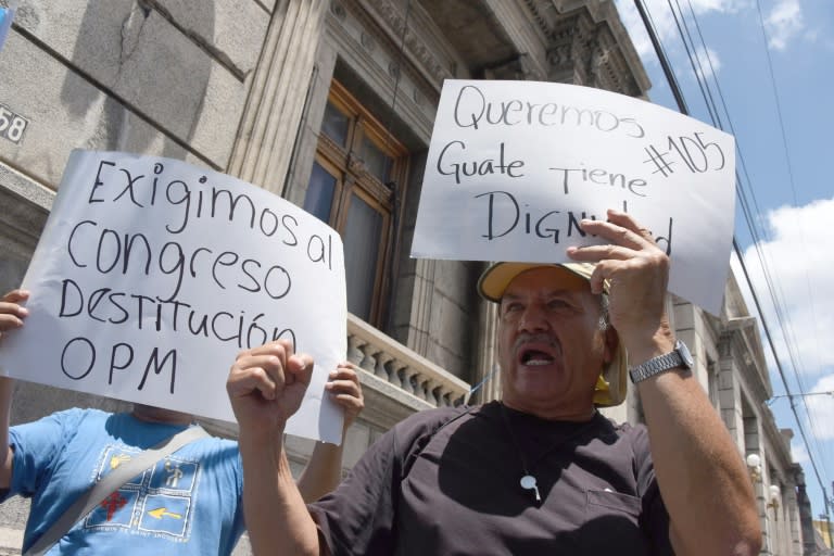 People rally outside the congress demanding the resignation of Guatemalan President Otto Perez in Guatemala City on September 1, 2015