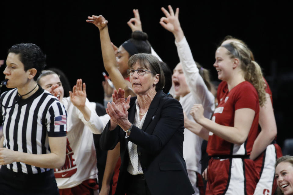 FILE - In this March 7, 2020, file photo, Stanford head coach Tara VanDerveer, center, reacts with her team during the second half of an NCAA college basketball game against UCLA in the semifinal round of the Pac-12 women's tournament in Las Vegas. Stanford is ranked No. 2 in the women's NCAA college basketball poll released Tuesday, Nov. 10, 2020.(AP Photo/John Locher, File)