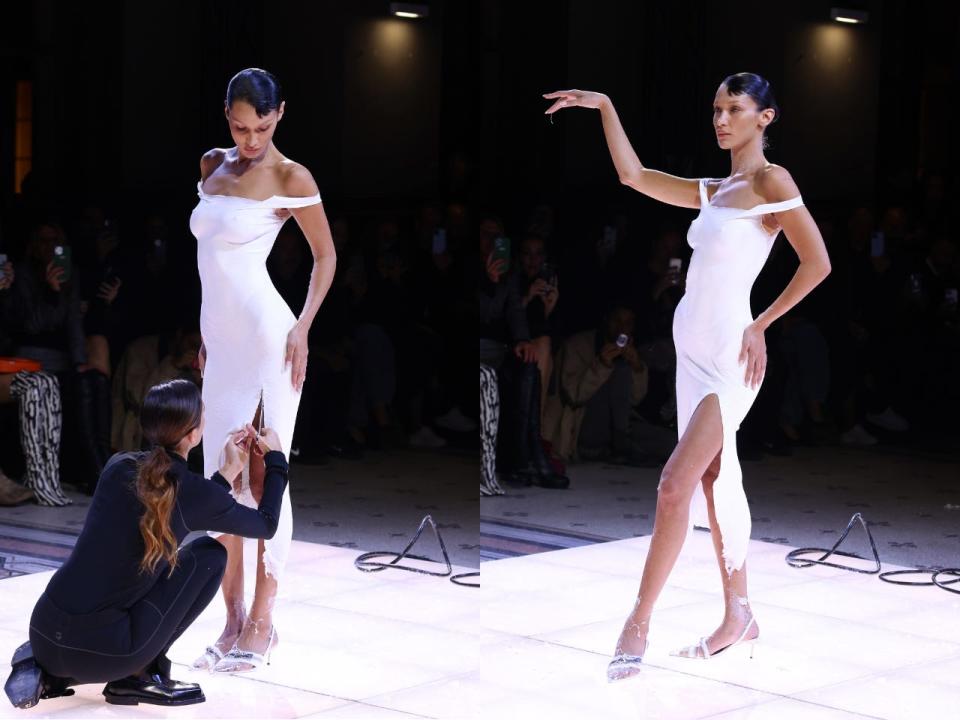 The completed dress featured a slit and off-the-shoulder sleeves.