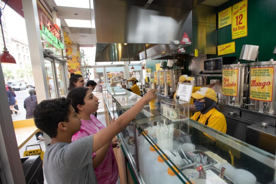 The tiny shop offered famously good deals on their hotdogs and tropical drinks out of its tiny Upper East Side shop. J.C.Rice