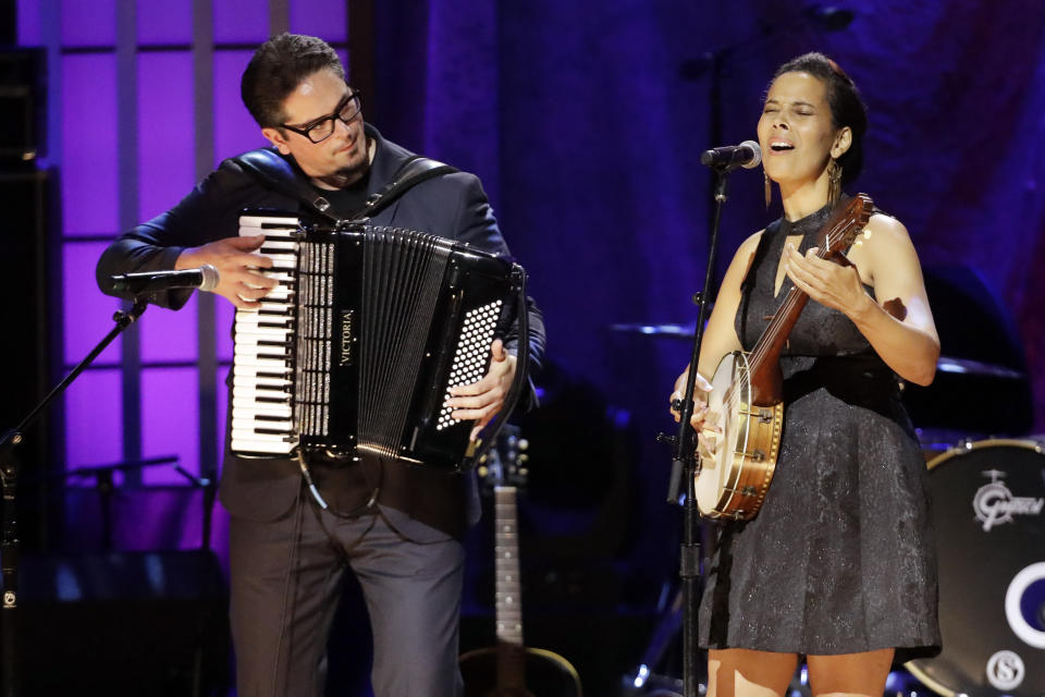 Francesco Turrisi, left, and Rhiannon Giddens perform during the Americana Honors & Awards show Wednesday, Sept. 11, 2019, in Nashville, Tenn. (AP Photo/Wade Payne)