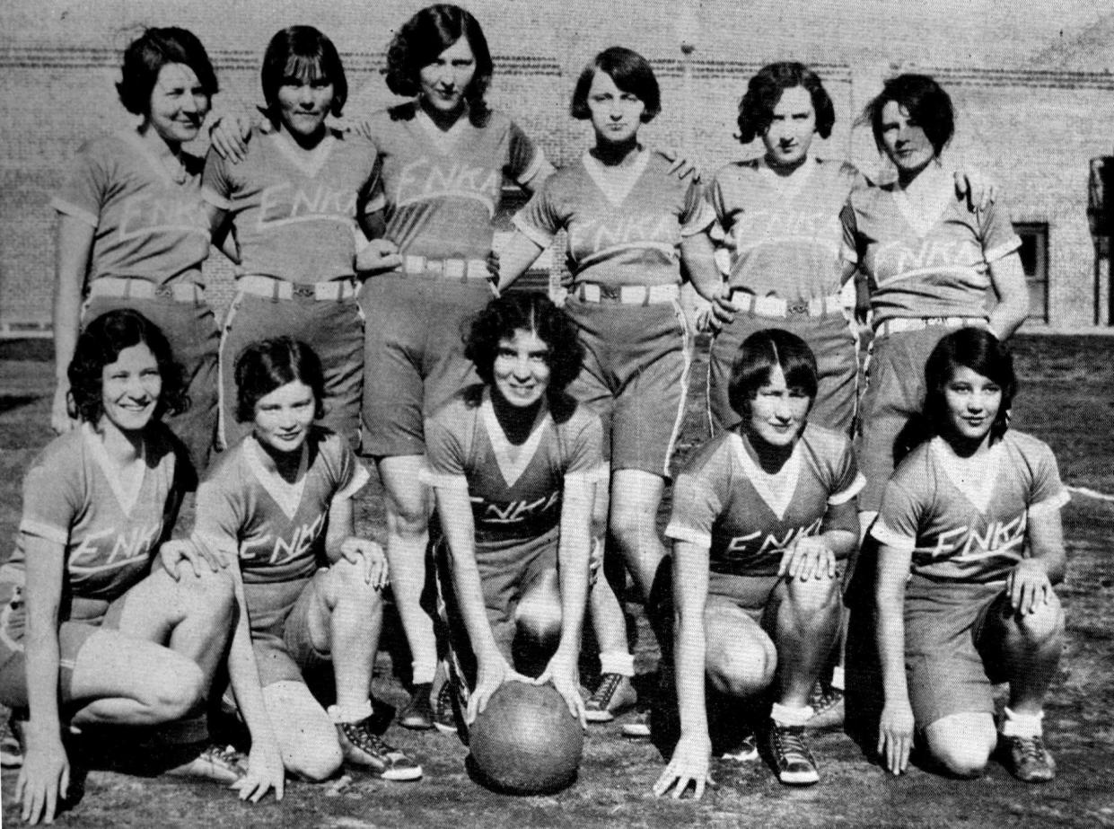 The E.N.K.A. women's basketball team, pictured here in 1931, included members of the 1920s Candler High School girls team and represented a golden age in women's sports.