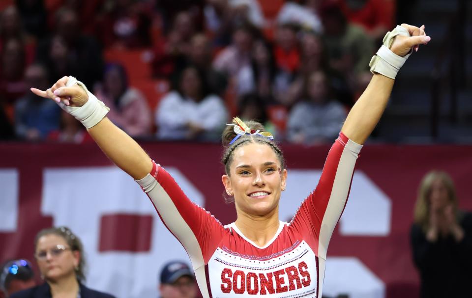 Oklahoma's Jordan Bowers celebrates the following the vault during the University of Oklahoma Sooners women's gymnastics meet with BYU, Texas Woman's University and Utah State at the Lloyd Noble Center in in Norman, Okla., Friday, Feb. 9, 2024.