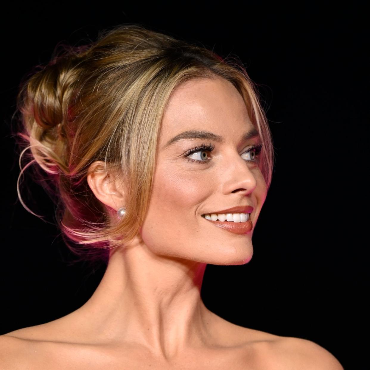  Margot Robbie on a global press tour for "Barbie". 