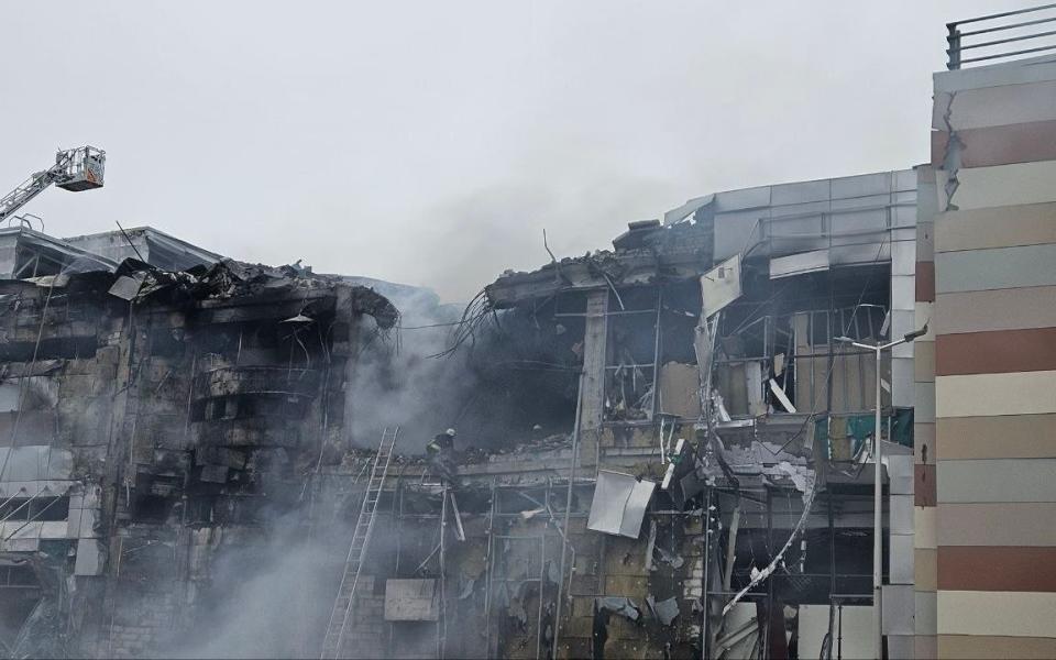 A damaged building in Dnipro, where four people are confirmed dead