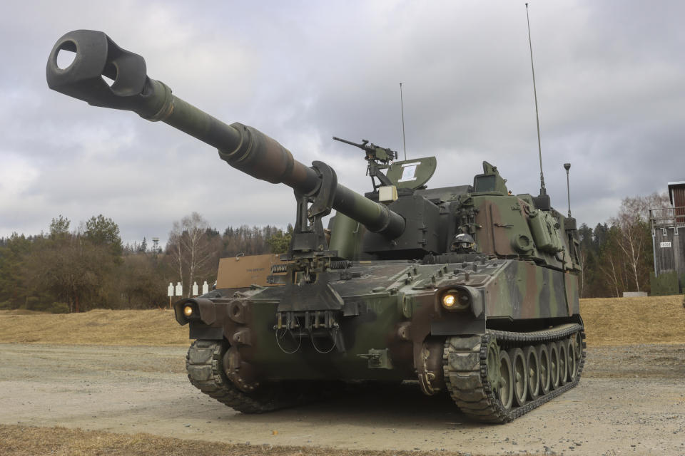 In this image provided by the U.S. Army, U.S. Soldiers from Battery A, 41st Field Artillery Regiment, 1st Armored Brigade Combat Team, 3rd Infantry Division, conduct live-fire exercises using the M109 Paladins at the Grafenwoehr Training Area, March 14, 2022. The first class of 635 Ukrainian fighters has finished a five-week advanced U.S. training course in Germany on sophisticated combat skills and armored vehicles, including M109 Paladins, that will be critical in the coming spring offensive against the Russians, the Pentagon said Friday, Feb. 17, 2023. (Capt. Patrick M. Connelly/U.S. Army via AP)