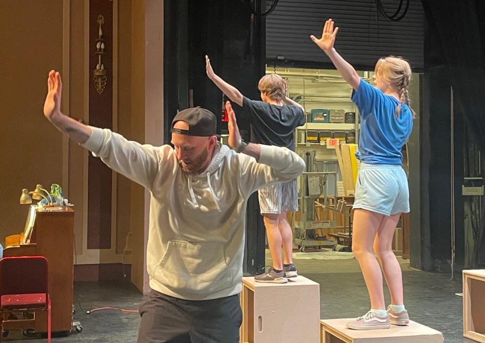 Kyle Aiden is volunteering his time this spring to put together the choreography for the Aberdeen Community Theatre production of "Matilda," which opens Tuesday. Behind Aiden are cast members Damon Sheets, left, and Charlie Hemke.