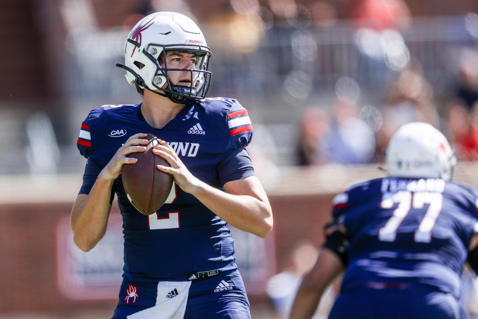 FILE - Richmond quarterback Reece Udinski looks for a receiver during the team's NCAA college football game against Stony Brook, Sept. 24, 2022, in Richmond, Va. Richmond plays at Sacramento State this weekend in the FCS playoffs. (Shaban Athuman/Richmond Times-Dispatch via AP, File)