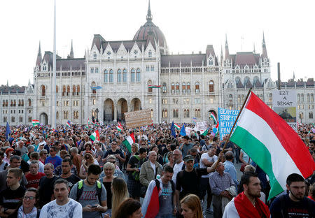 People attend a protest against the government of Prime Minister Viktor Orban in Budapest, Hungary, April 21, 2018. REUTERS/Bernadett Szabo