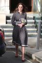 <p>The Duchess wears a Kate Spade dress and maroon suede pumps during her visit to The Foundling Museum in London. </p>