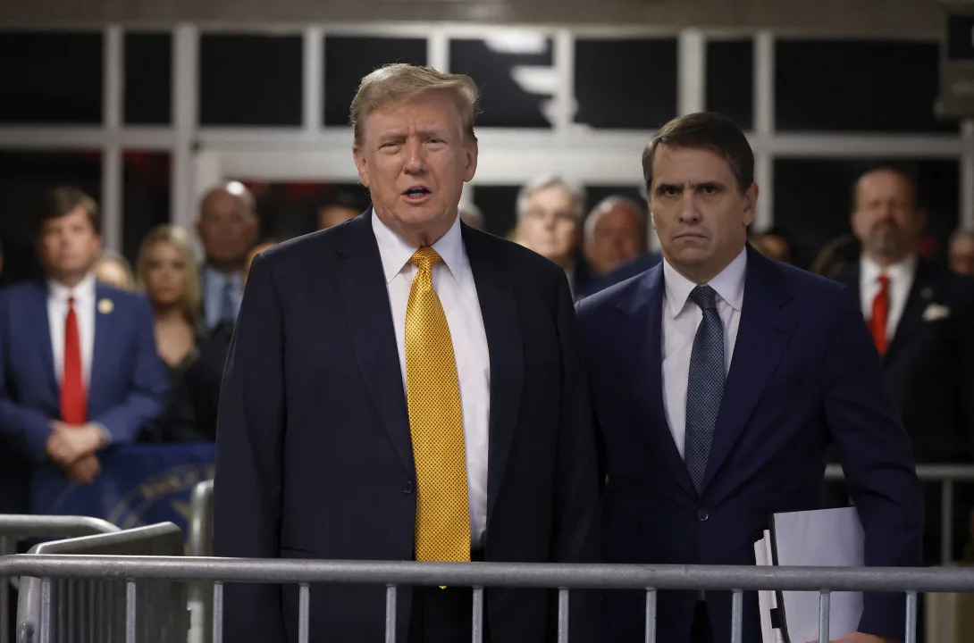 Former President Donald Trump speaks to reporters. (Michael M. Santiago/Pool via Getty Images)