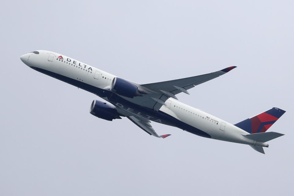 A Delta Air Lines Airbus A350-900 plane takes off from Sydney Airport in Sydney, Australia, October 28, 2020.  REUTERS/Loren Elliott