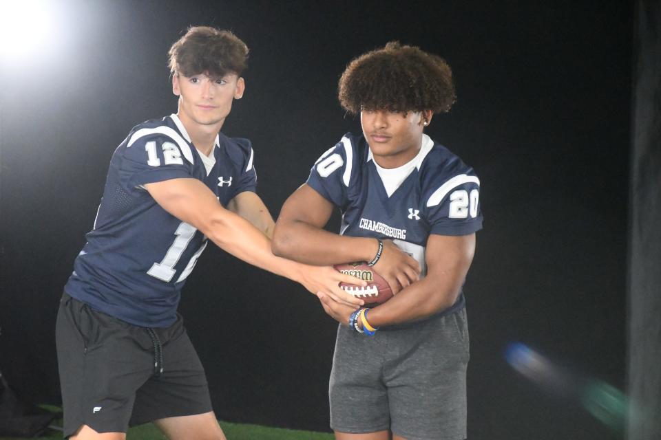Chambersburg's Riley Harmon (12) and Dayre Senft (20) take part in Mid-Penn Media Day at Cumberland Valley High School on Wednesday, August 2, 2023