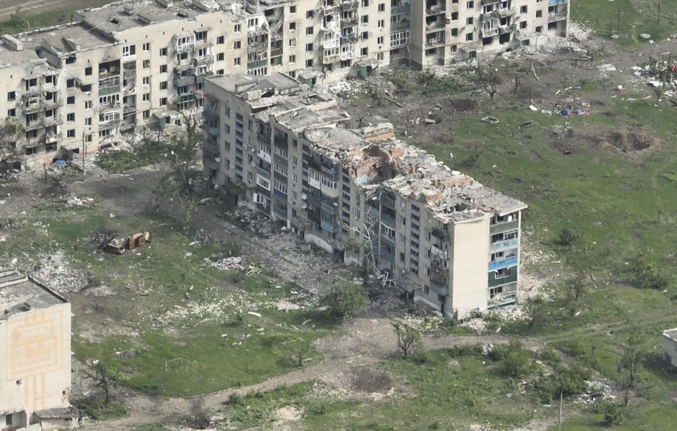 This photo taken from a drone video provided by Ukraine Patrol Police, shows devastation in Chasiv Yar, an eastern Ukrainian city Russia is assaulting, Ukraine, Monday, April 29, 2024. The footage shows the community of Chasiv Yar - which is set amid green fields and woodland - reduced to a skeletal ghost town with few residents left. The apocalyptic scene is reminiscent of the cities of Bakhmut and Avdiivka, which Ukraine yielded after months of bombardment and huge losses for the Kremlin’s forces. (Ukraine Patrol Police via AP)