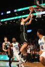 Dec 26, 2018; Brooklyn, NY, USA; Brooklyn Nets forward Joe Harris (12) lays the ball in for the game winning basket against the Charlotte Hornets during the second overtime at Barclays Center. Mandatory Credit: Andy Marlin-USA TODAY Sports