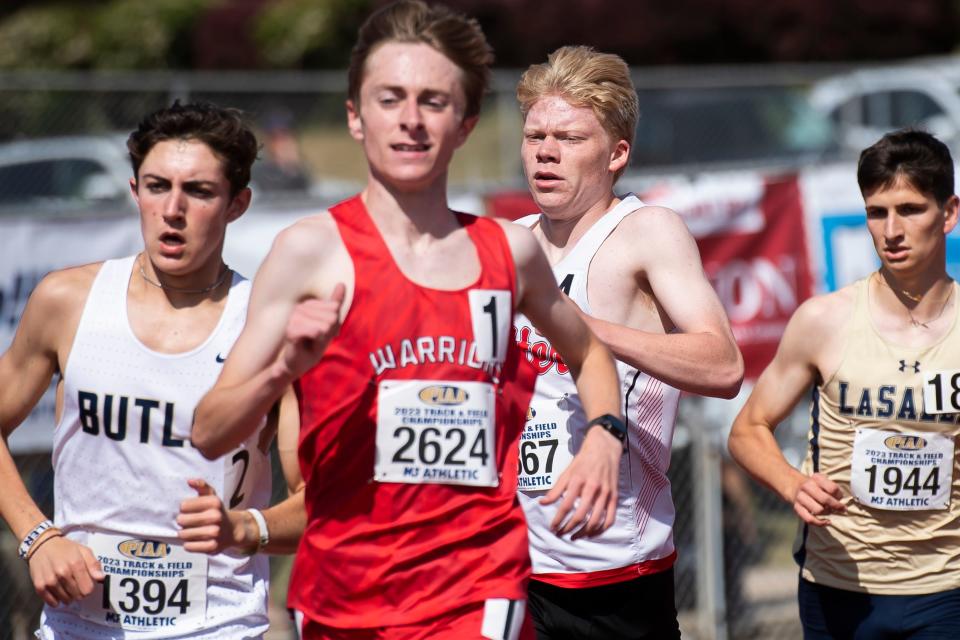 Hatboro-Horsham's Brian DiCola (second from right) moves closer to the lead in the 3A 3200-meter run at the PIAA Track and Field Championships at Shippensburg University Saturday, May 27, 2023. DiCola won gold and set a meet record with a 8:47.39 finish.