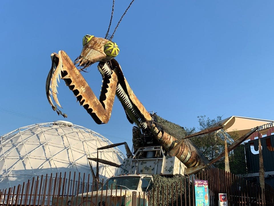 The praying mantis sculpture at Downtown Container Park.