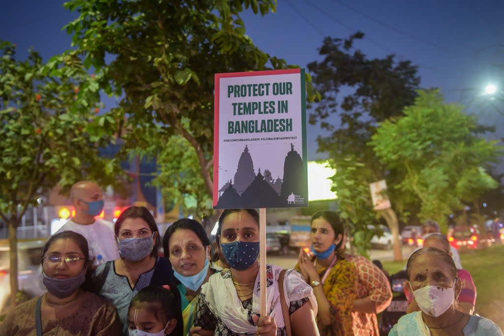 Supporters of a Hindu group take part in a demonstration in Ahmedabad, Gujarat to protest the violence in Bangladesh earlier this month  (AFP via Getty Images)
