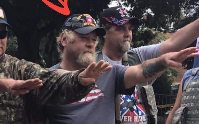 A Nazi salute protester wearing an 82nd Airborne hat - @BFriedmanDC/Twitter