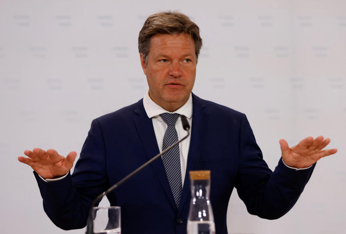 German Vice Chancellor Robert Habeck stands at a podium.