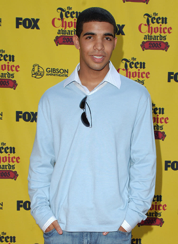 drake in a sweater and jeans