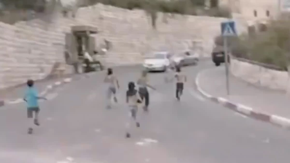 A video purportedly showed an Israeli person driving a hatchback car and striking two children who were reportedly throwing rocks. 