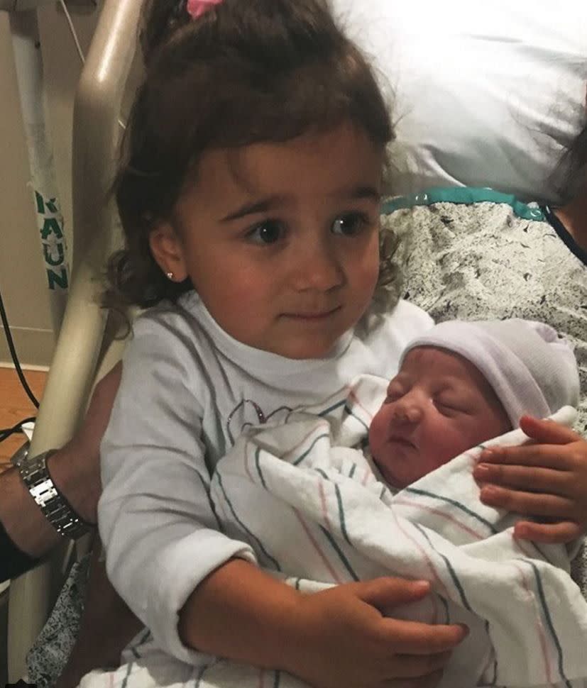 Kevin Jonas' wife Danielle shared a precious picture of her daughter Alena holding their newborn baby Valentina for the first time. "Love #valentina #alena," Danielle captioned the sweet picture.