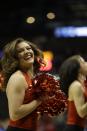 Wisconsin cheerleaders perform during the first half of a second-round game in the NCAA college basketball tournament Thursday, March 20, 2014, in Milwaukee. (AP Photo/Jeffrey Phelps)