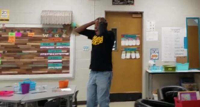 James Anthony, a custodian, is surprised by kindergartners signing “Happy Birthday.” (Photo: Hickerson Elementary)