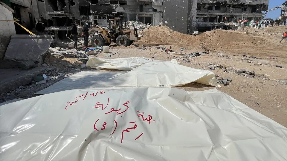 Gazan teams from the health department, civil defense, crime scene investigation, and forensics investigate what remains of Gaza's Al-Shifa Hospital on April 8, 2024. - Ramzi Mahmud/Anadolu/Getty Images