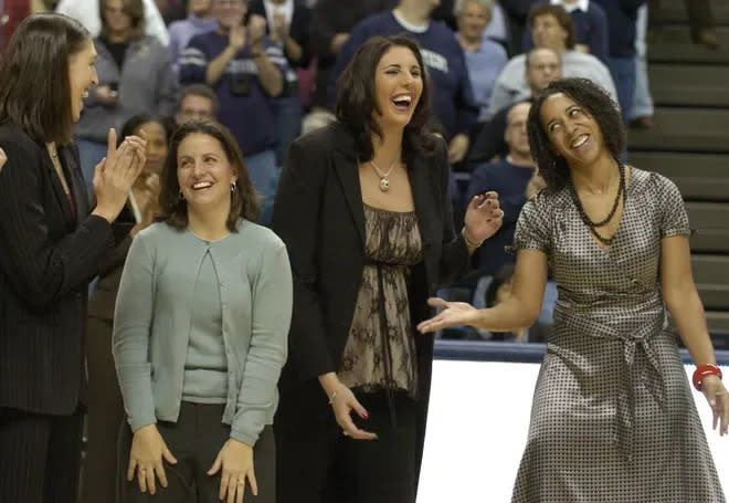 Kara Wolters, center, already a Women's Basketball Hall of Famer, is part Holliston's inaugural Hall of Fame class this weekend.