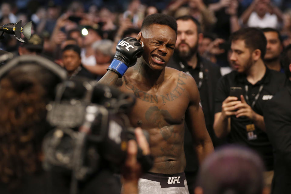 MELBOURNE, AUSTRALIA - OCTOBER 06: Israel Adesanya makes his way to the Octagon for the Middleweight title bout during UFC 243 at Marvel Stadium on October 06, 2019 in Melbourne, Australia. (Photo by Darrian Traynor/Getty Images)