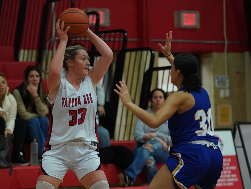 Tappan Zee's Emma McHugh (33) works a play as Ardsley's Leah Burriss (30) works to defend during girls basketball action at Tappan Zee High School in Orangeburg on Thursday, Jan. 25, 2024.