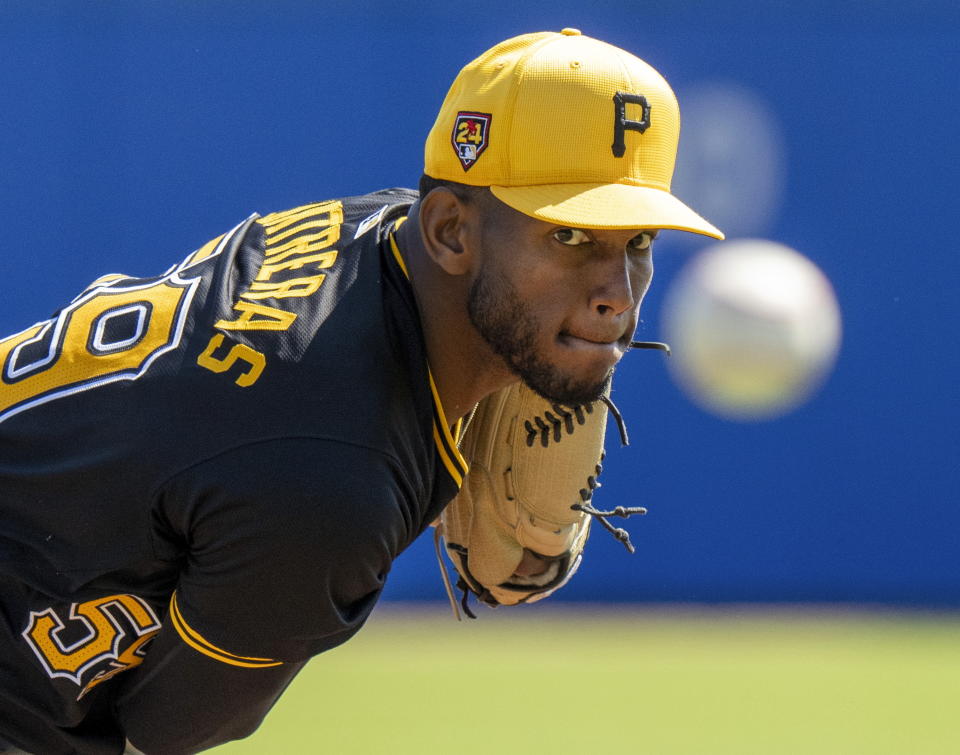 Pittsburgh Pirates starting pitcher Roansy Contreras throws a warmup pitch before a spring training baseball game against the Toronto Blue Jays in Dunedin, Fla., Monday, Feb. 26, 2024. (Frank Gunn/The Canadian Press via AP)