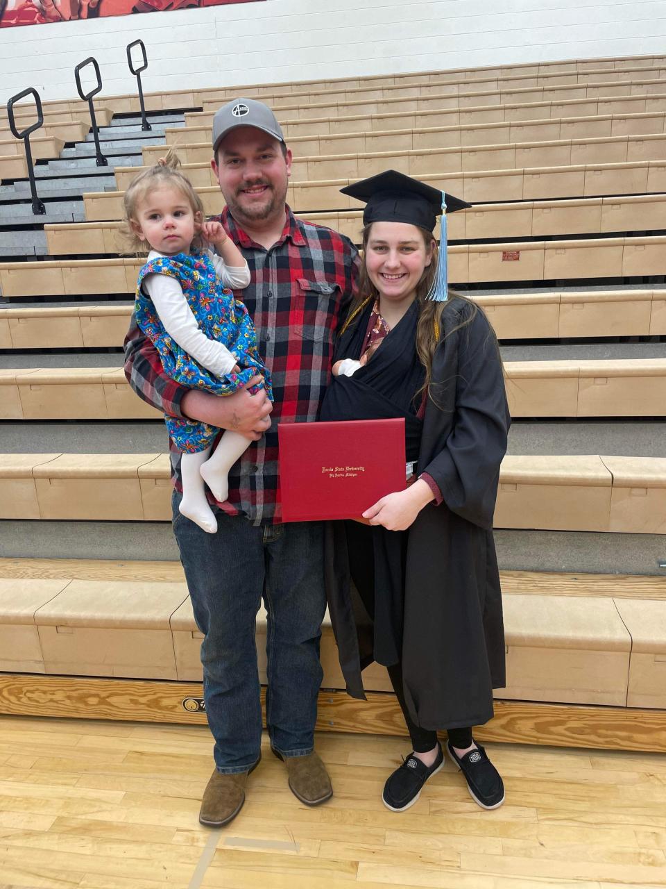 Caleb Szymchack, Grace Szymchack and their daughters Isabelle (18 months old) and Annabelle (2 weeks old).