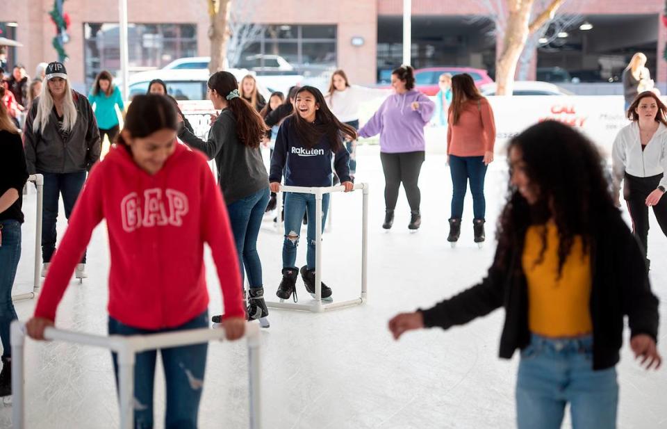People skate at Modesto on Ice in Modesto, Calif., on Thursday, Jan. 2, 2020.