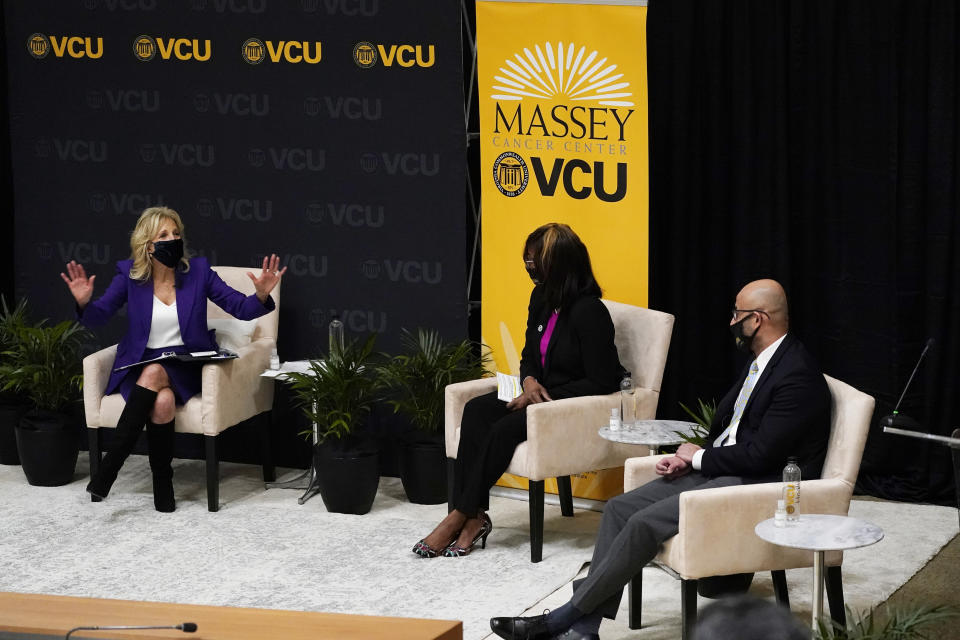 First lady Jill Biden, left, speaks during a forum at the Massey Cancer center at Virginia Commonwealth University for a discussion about cancer disparities. in Richmond, Va., Wednesday, Feb. 24, 2021. (AP Photo/Steve Helber)