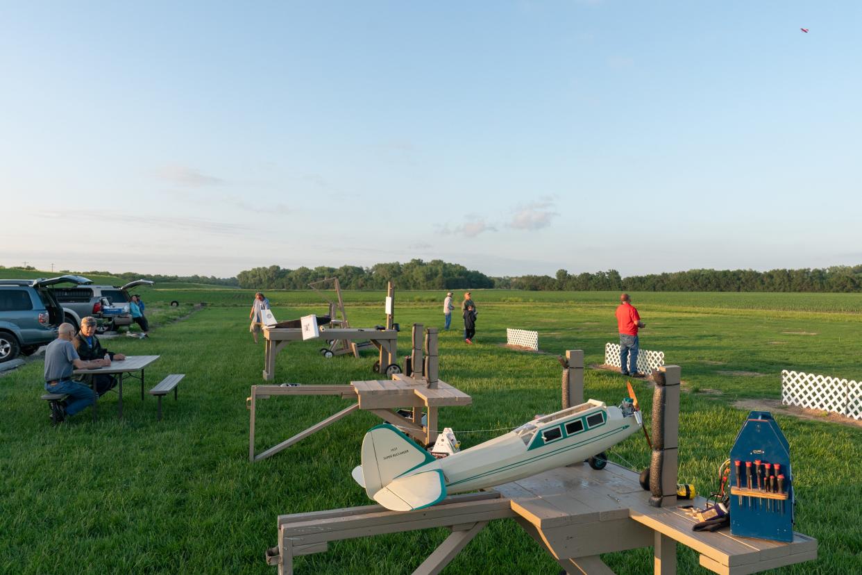 Custom workbenches help members of the Foundation for Aeronautical Education work on their model airplanes between flights at the airstrip in North Topeka.