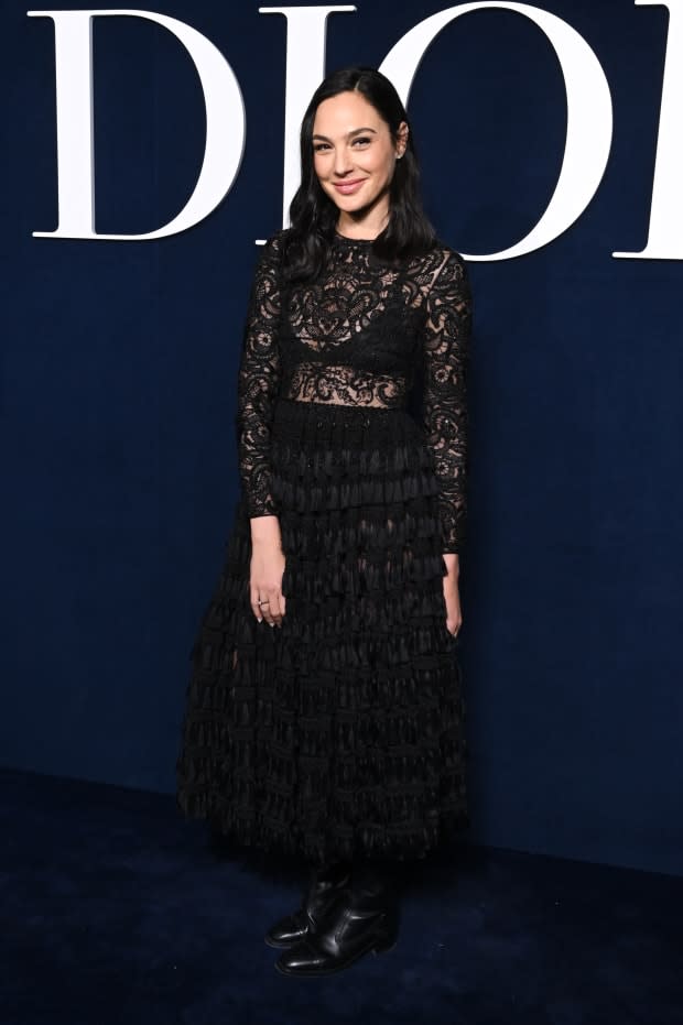 PARIS, FRANCE - FEBRUARY 28: (EDITORIAL USE ONLY - For Non-Editorial use please seek approval from Fashion House) Gal Gadot attends the Christian Dior Womenswear Fall Winter 2023-2024 show as part of Paris Fashion Week on <a href="https://parade.com/living/february-holidays-observances" rel="nofollow noopener" target="_blank" data-ylk="slk:February;elm:context_link;itc:0;sec:content-canvas" class="link ">February</a> 28, 2023 in Paris, France. (Photo by Stephane Cardinale - Corbis/Corbis via Getty Images)<p><a href="https://www.gettyimages.com/detail/1470263626" rel="nofollow noopener" target="_blank" data-ylk="slk:Stephane Cardinale - Corbis/Getty Images;elm:context_link;itc:0;sec:content-canvas" class="link ">Stephane Cardinale - Corbis/Getty Images</a></p>