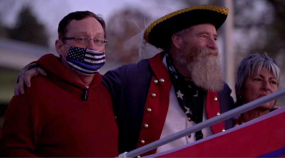 This still, from Mitch McCabe's "23 Mile," shows a rally around the 2020 presidential election in Michigan.