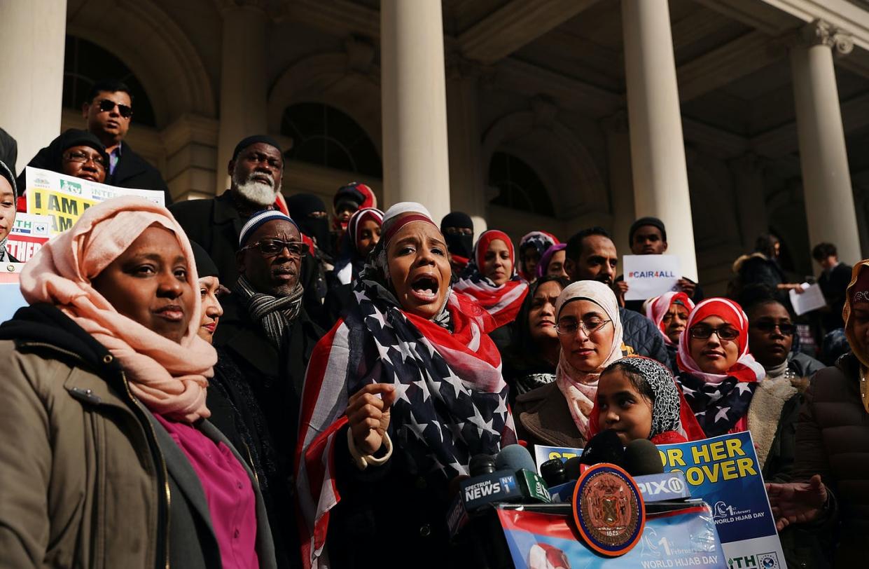 <span class="caption">World Hijab Day started in the U.S. and is one way women have asserted pride in wearing a headscarf.</span> <span class="attribution"><a class="link " href="https://www.gettyimages.com/detail/news-photo/women-wear-american-flag-head-scarfs-at-an-event-at-city-news-photo/633356594?adppopup=true" rel="nofollow noopener" target="_blank" data-ylk="slk:Spencer Platt/Getty Images;elm:context_link;itc:0;sec:content-canvas">Spencer Platt/Getty Images</a></span>