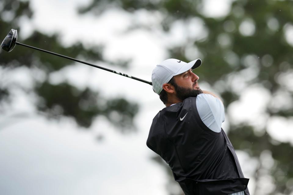 Scottie Scheffler plays his shot from the 10th tee during the final round of the RBC Heritage golf tournament in Hilton Head, S.C., on April 21, 2024.