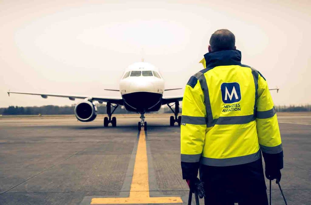 John Menzies undated handout photo of a member of their staff. The airport services and support business has rejected a takeover move and described it as “opportunistic” (John Menzies/PA) (PA Media)