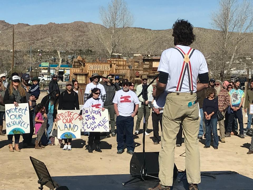 Volunteer Travis Puglisi speaks to more than 100 people on Saturday, Jan. 26, at the "Assembly to Shutdown the Shutdown for Joshua Tree National Park" event in Joshua Tree.