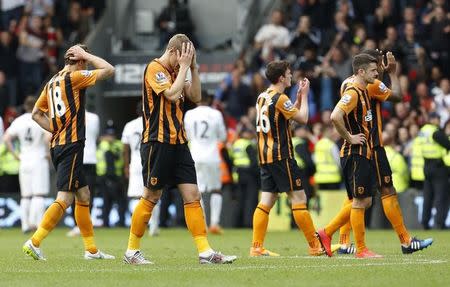 Hull City players looks dejected at full time. Action Images via Reuters / Craig Brough